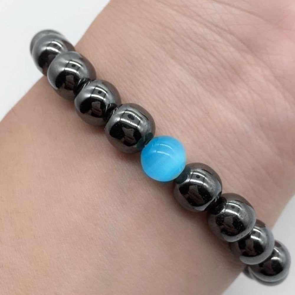 Hæmatit slankende armbånd med blå opalperle